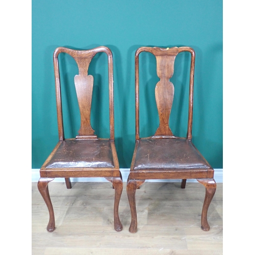 333 - A set of four oak Queen Anne style splat back Dining Chairs on cabriole supports