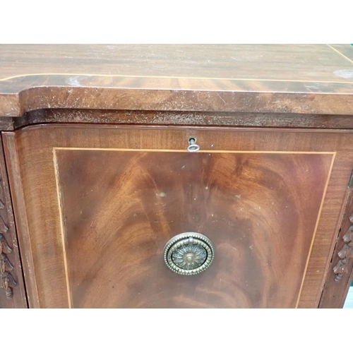 335 - A Georgian style mahogany and inlaid Sideboard fitted pair of cupboard doors flanking frieze drawer ... 