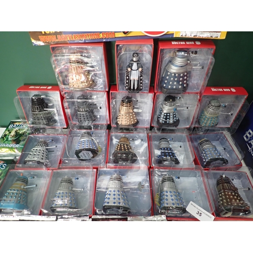 35 - Eighteen boxed Collector's Models of Daleks, eighteen packs of Doctor Who Trading Cards and a collec... 