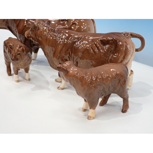 384 - A Beswick Charolais Bull, Cow and two Calves