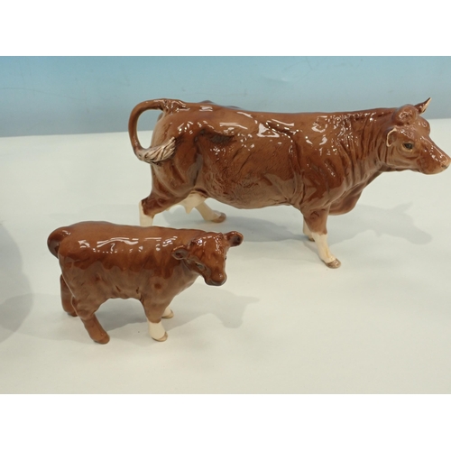 384 - A Beswick Charolais Bull, Cow and two Calves