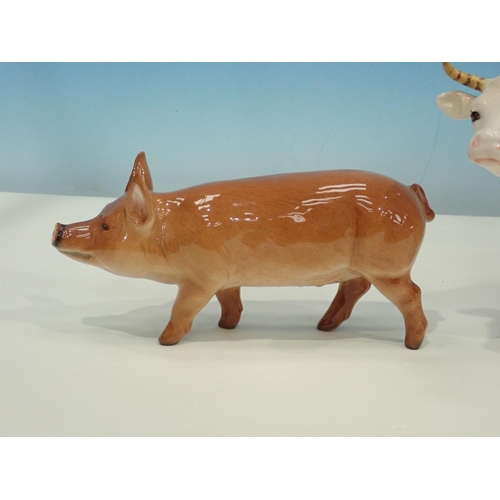 385 - A Beswick figure of Guernsey Cow with horns, a figure of Calf and a figure of Pig