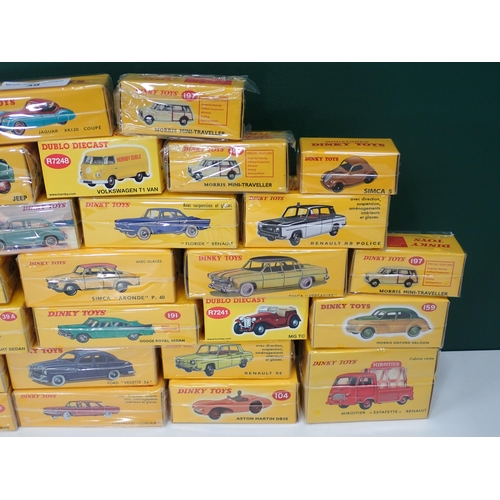 39 - Thirty three boxed Atlas Models Dinky Toys