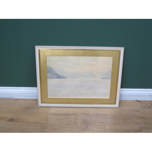 428 - AINSLIE BEAN. A Lake Scene with mountains beyond, signed, watercolour, 13½ x 20in