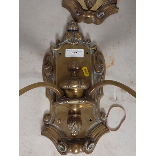 537 - A pair of antique brass two branch Wall Lights