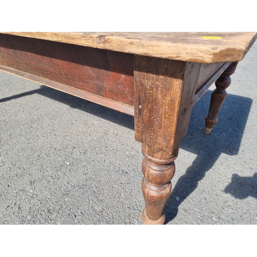 552 - A pine scrub top Farmhouse Table, fitted frieze drawer and on baluster turned supports, 6ft 9in L x ... 