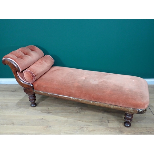 555 - A Victorian button upholstered on the Chaise Longue with turned supports