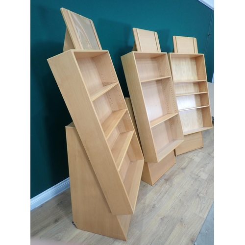 561 - A set of three beech Bookshop display Stands with adjustable shelves, 5ft 4in H x 2ft 3in W