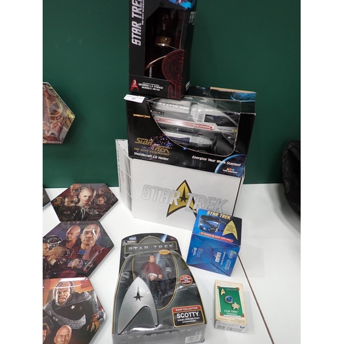 57 - Seven Star Trek Collector's Plates, two boxed Figures, a boxed Shuttlecraft, boxed U.S.S. Enterprise... 