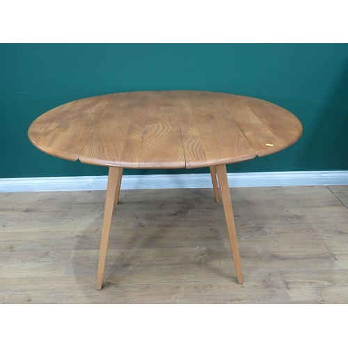 574 - An Ercol elm Kitchen dropleaf Table on squared supports, 4ft open