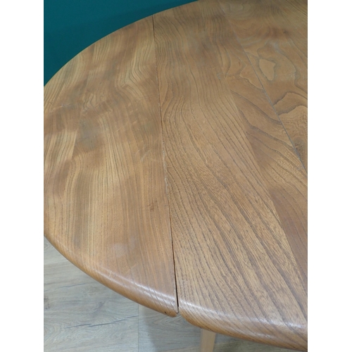 574 - An Ercol elm Kitchen dropleaf Table on squared supports, 4ft open