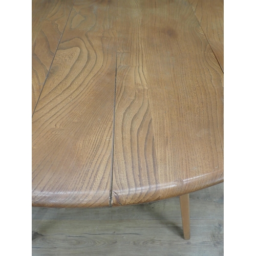 574 - An Ercol elm Kitchen dropleaf Table on squared supports, 4ft open