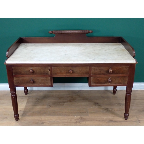 576 - A Victorian mahogany Washstand with later marble top fitted five frieze drawers on turned supports, ... 