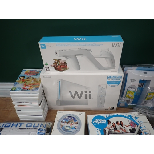 58 - A Nintendo Wii Console, Sports Resort, We're in the Movies, Games, Dual Charging Point, etc.