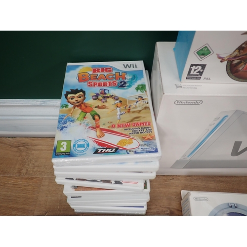 58 - A Nintendo Wii Console, Sports Resort, We're in the Movies, Games, Dual Charging Point, etc.