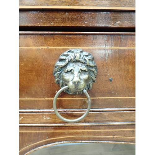 586 - A 19th Century mahogany and satinwood string bow fronted Sideboard fitted two cupboard doors flankin... 