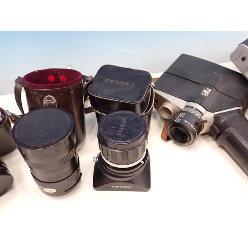 591 - A box of Cameras and Equipment including Zenit-E Camera and various Lenses