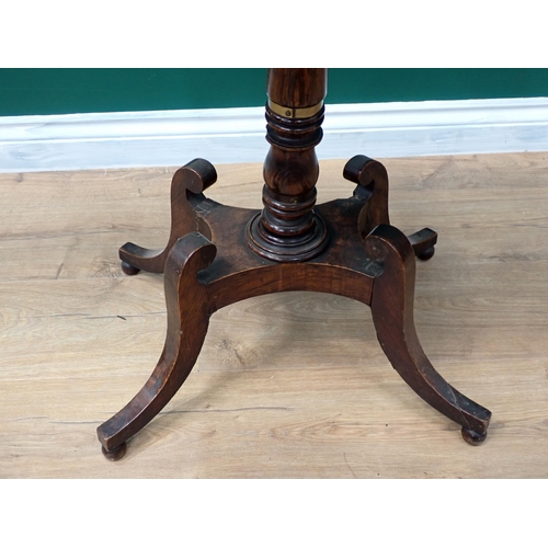 606 - A Regency rosewood Pillar Table with rectangular crossbanded top on turned column with four s-shaped... 