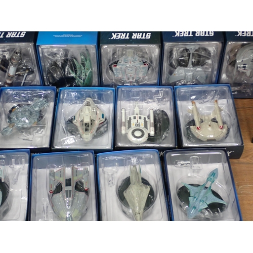 61 - Seventeen boxed Star Trek Collector's Models, a U.S.S. Voyager Complete Series of DVDS, two boxed St... 