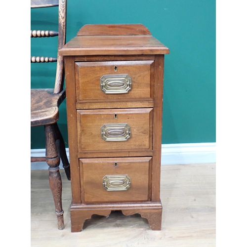 610 - A pair of walnut Bedside Chests each fitted three drawers and an ash and elm Oxford Chair