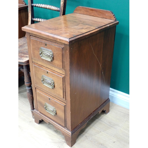 610 - A pair of walnut Bedside Chests each fitted three drawers and an ash and elm Oxford Chair