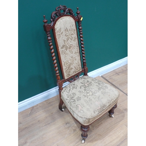 621 - A Victorian walnut Prayer Chair with beige needlework upholstery