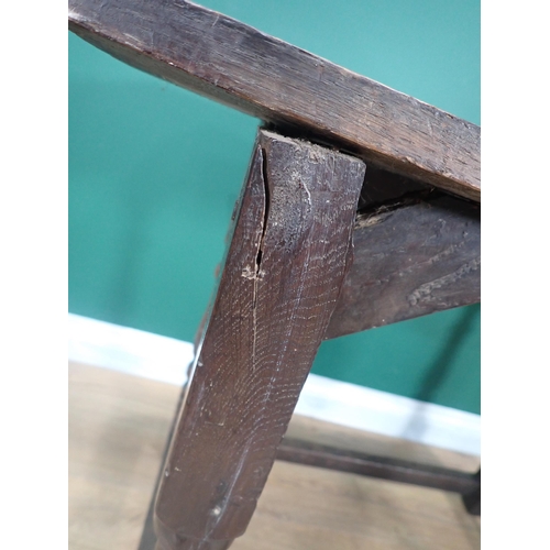 623 - An early 18th Century and later oak Side Table with moulded top on turned supports united by surroun... 