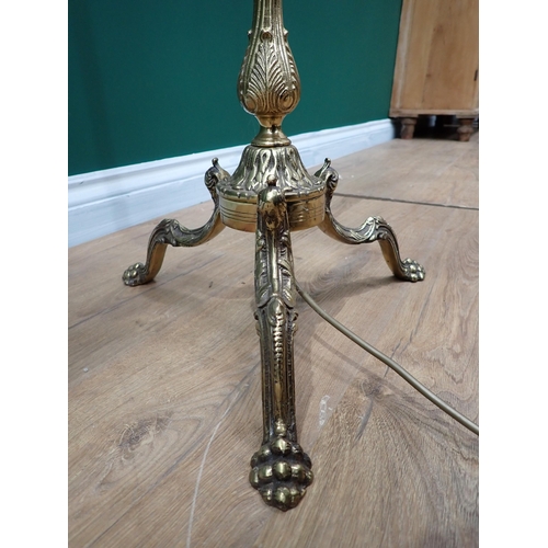 644 - A brass Standard Lamp and Shade with tripod base (passed PAT)