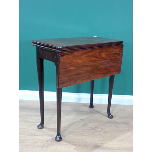 660 - An 18th Century mahogany fold-over and dropleaf Tea Table on pad feet 2ft 5in H x 2ft 3in W