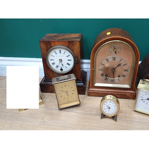 667 - A walnut cased Mantel Clock, two oak cased Mantel Clock and three other Clocks