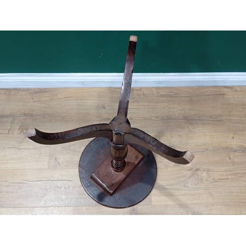 676 - A 19th Century mahogany and fruitwood circular Pillar Table on tripod base 2ft 3in H x 1ft 4in D