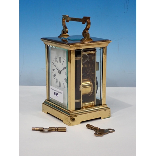 693 - A brass cased Carriage Clock 6in H