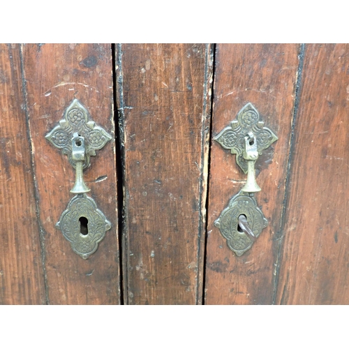 696 - A 19th Century stained pine Dresser and Rack fitted two frieze drawers above pair of cupboard doors ... 