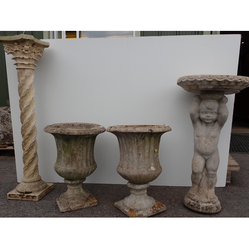 711 - A cherub Bird Bath, a modern garden Sun Dial, and a pair of composite Garden Urns