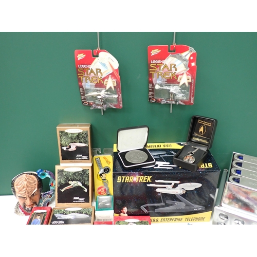 72 - Various Star Trek Collectables, Star Trek series DVDs, U.S.S. Enterprise Telephone, etc.