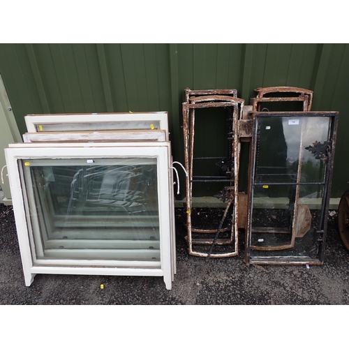 720 - A quantity of white painted Sash Windows and a quantity of cast iron Window Frames