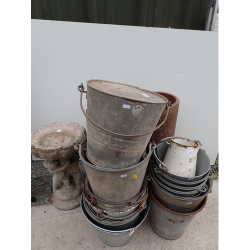 727 - A quantity of galvanised and enamel Buckets, a Bird Bath and two Chimney Pots