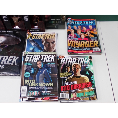 74 - Quantity of Star Trek Comic Books, DVDs and collectable Figures