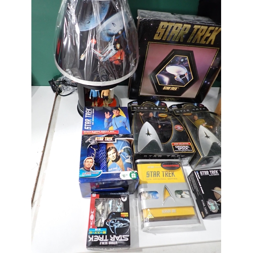 89 - A Star Trek Lamp, leather Jacket, Collectable Figures and other Star Trek Collectables