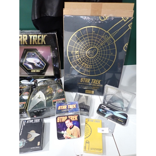 89 - A Star Trek Lamp, leather Jacket, Collectable Figures and other Star Trek Collectables