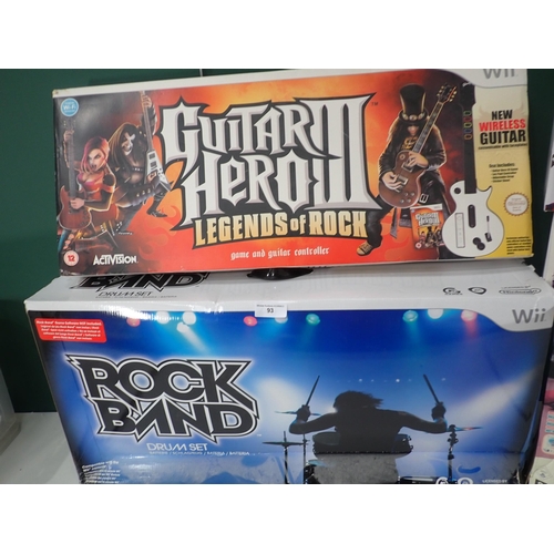 93 - An Xbox 360 Kinect sensor, Nintendo Wii Rock Band drum set, Guitar Hero wireless Guitar, Family Trai... 