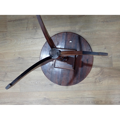 604 - A 19th Century rosewood Pillar Table with circular moulded top above a finely turned baluster column... 