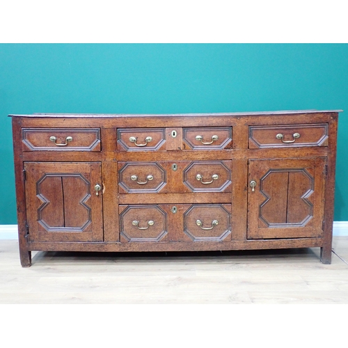 745 - A late 17th Century oak Dresser Base fitted five drawers and pair of doors with applied mouldings, 6... 