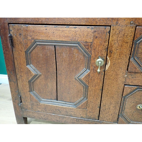 745 - A late 17th Century oak Dresser Base fitted five drawers and pair of doors with applied mouldings, 6... 