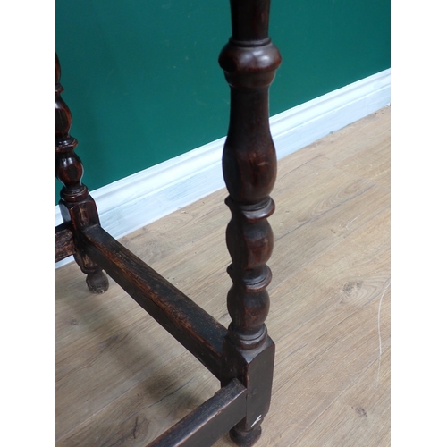 746 - A late 17th Century oak Side Table fitted frieze drawer and raised on baluster turned supports with ... 