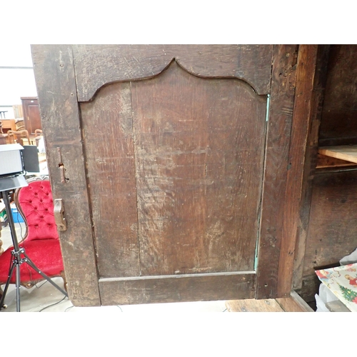 752 - An 18th Century oak Cwpwrydd deuddarn fitted pair of cupid's bow fielded panel doors to upper sectio... 