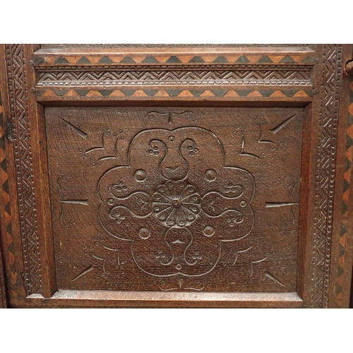 753 - A Charles I and later oak Court Cupboard, the upper section fitted pair of cupboard doors, the inlai... 