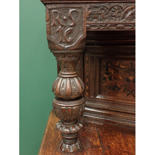 753 - A Charles I and later oak Court Cupboard, the upper section fitted pair of cupboard doors, the inlai... 