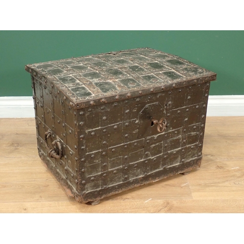 755 - A 17th Century iron bound oak Strong Box with single key lock, two handles and strap hinged lid encl... 