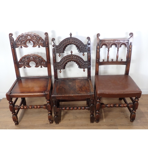 756 - A 17th Century style oak Derbyshire Chair with thumb cut double back stretchers, a 17th Century styl... 